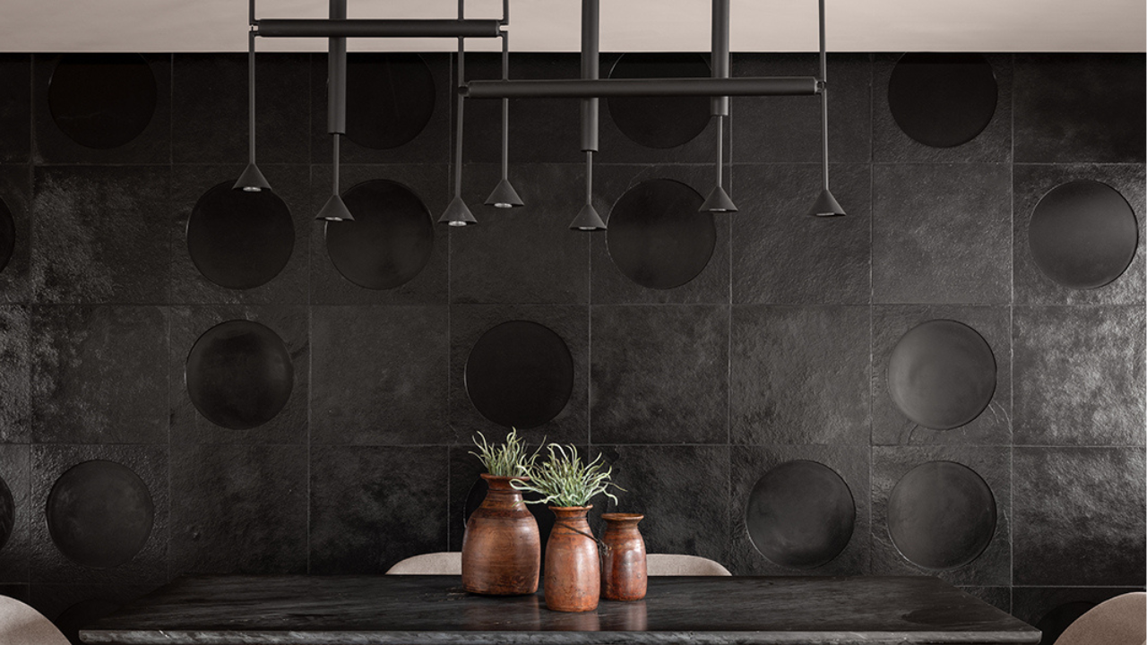 Designmint metal wall art and pendant lights in a modern dining room